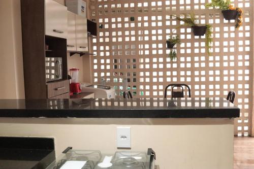 a kitchen with a sink and a counter top at Casa c WiFi e otima localizacao em Barreirinhas MA in Barreirinhas