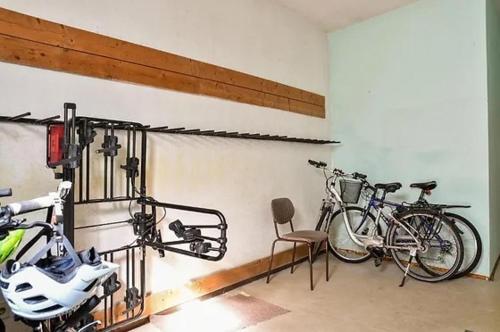two bikes are parked in a room at Family Apartment Šumava in Bayerisch Eisenstein