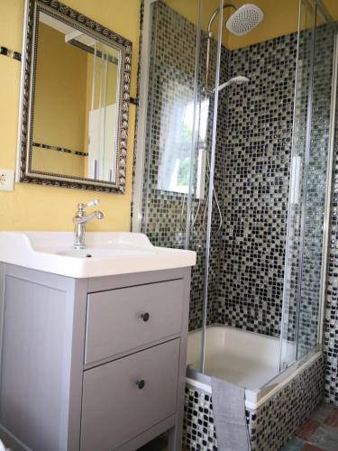 a bathroom with a sink and a shower at Anna in Anklam
