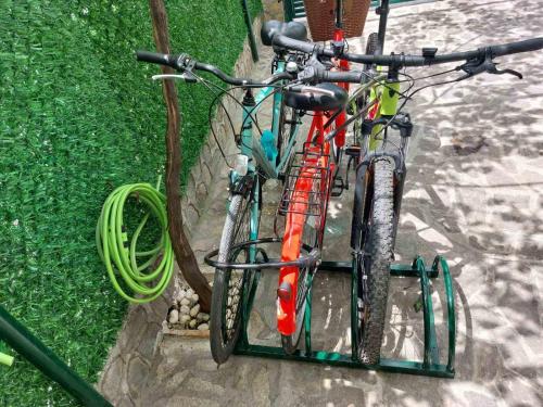 two bikes are parked next to a hose at Villa Ivanovi in Ohrid