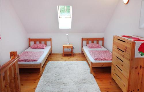 Katil atau katil-katil dalam bilik di 1 Bedroom Gorgeous Home In Choczewo