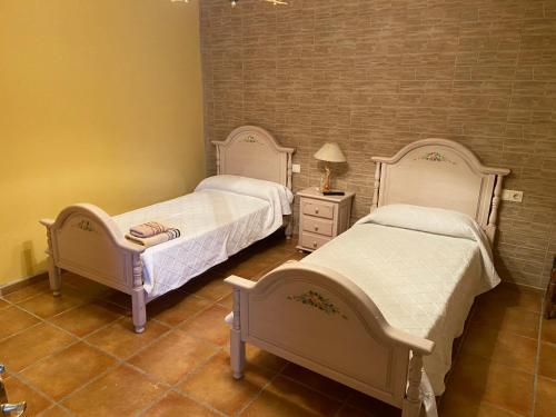 Postel nebo postele na pokoji v ubytování Casa Rural Can Salvado