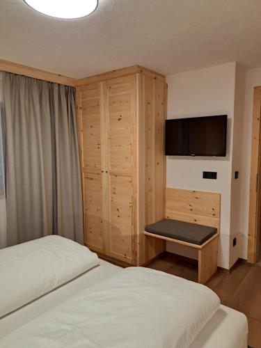 Un pat sau paturi într-o cameră la Pliegermoar - Adults Only