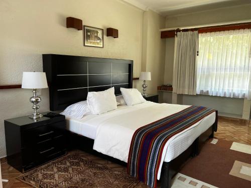 Cama o camas de una habitación en Casa Bugambilia, Un Pequeño Hotel en Tepoztlán