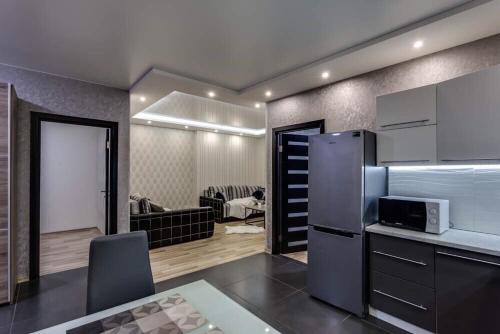 Kuchyň nebo kuchyňský kout v ubytování Comfortable Apartments
