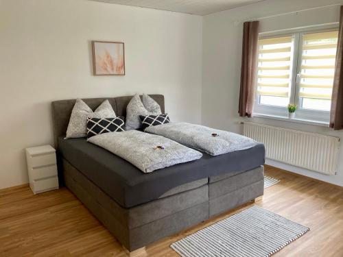 Postel nebo postele na pokoji v ubytování Landhaus Graf
