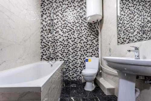 Vonios kambarys apgyvendinimo įstaigoje Comfortable Apartments
