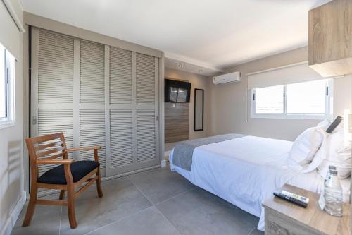 Ένα ή περισσότερα κρεβάτια σε δωμάτιο στο Nobile Hotel Montoya