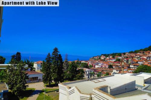 an aerial view of a city with buildings and trees at Apartments FANTASY with Free Parking in Ohrid