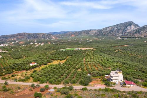 an aerial view of a farm with mountains in the background at Princess Sissi, Villa-House with private pool and garden in Sissi