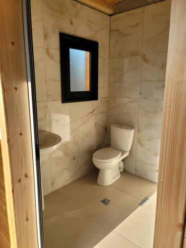 Koupelna v ubytování Beni Rooms Tale