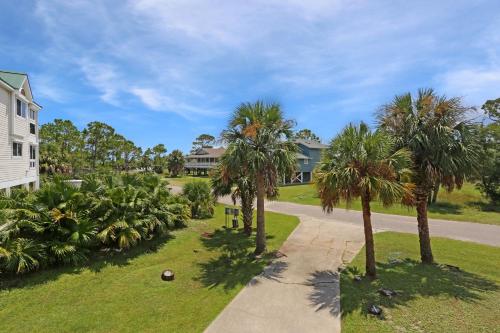 Κήπος έξω από το Boardwalk Sandpiper by Pristine Properties Vacation Rentals