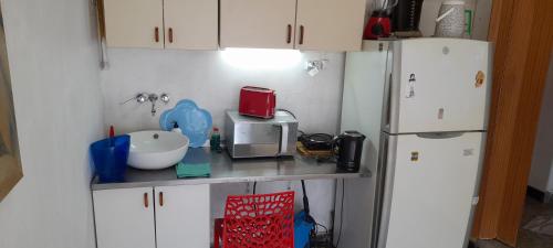 Køkken eller tekøkken på EnmicasaSSJ-Rosario