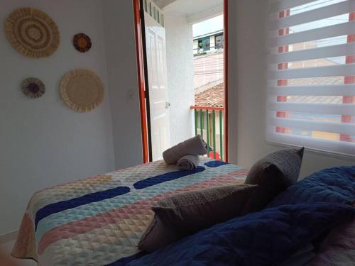 Ένα ή περισσότερα κρεβάτια σε δωμάτιο στο Casa moderna y acogedora.