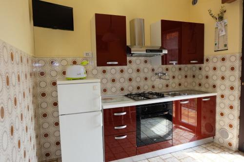 Kuchyň nebo kuchyňský kout v ubytování B&B L'Edera