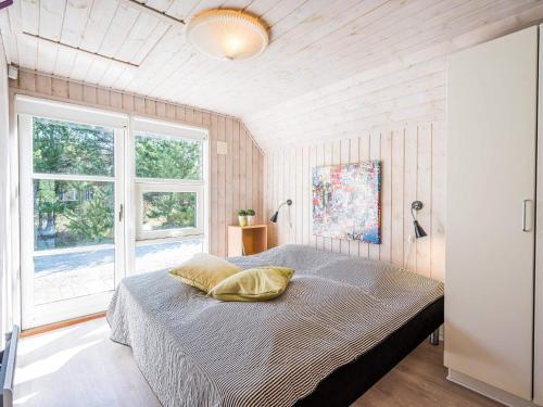 Postel nebo postele na pokoji v ubytování Holiday home Nørre Nebel XLIV