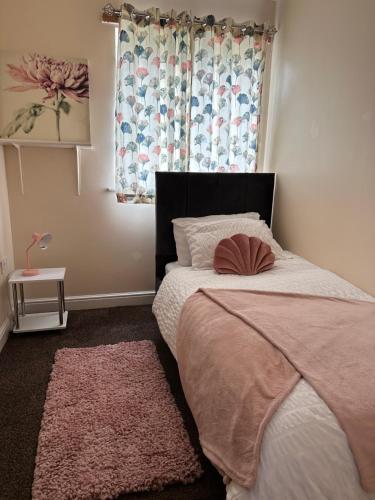Postel nebo postele na pokoji v ubytování Zenith Apartment