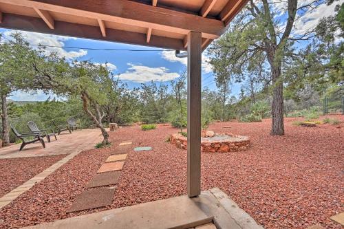 a patio with a bench and a picnic table at Patio and Panoramic Desert Views Sedona Getaway! in Sedona