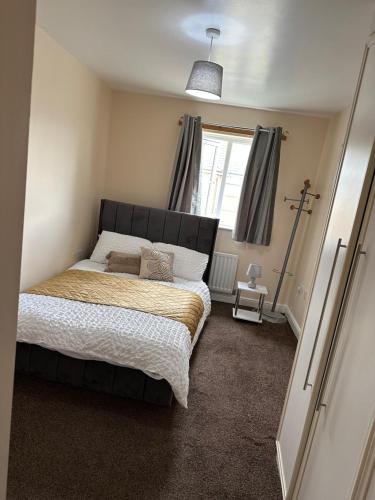 Postel nebo postele na pokoji v ubytování Zenith Apartment