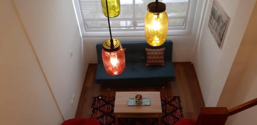 an overhead view of a room with lights at 100 Wonderful House in Bogotá