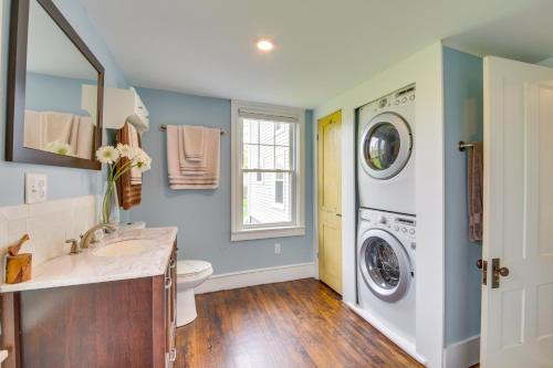 a bathroom with a sink and a washing machine at Rockland Home with Deck 5 Mins to Historic Downtown! in Rockland