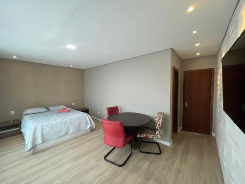 Ένα ή περισσότερα κρεβάτια σε δωμάτιο στο Duplex em Guarapari com piscina privativa!