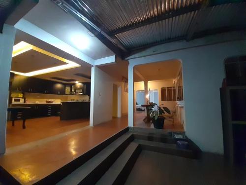 a view of a living room and a dining room at Casa Elenita in San Juan La Laguna