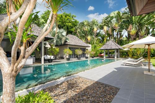 an image of a swimming pool at a villa at Luxury 3BR Villa C Layan Estate: Idyllic Retreat near Beach in Layan Beach