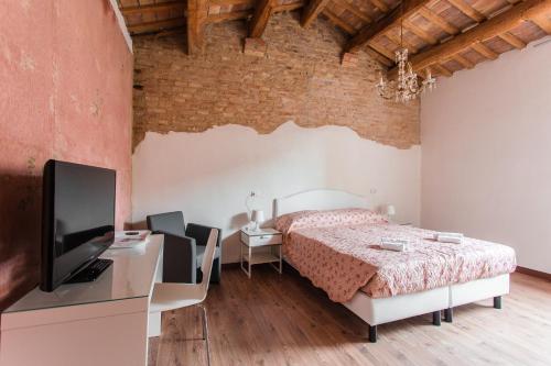 Appartamenti Ravennaにあるベッド