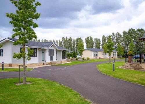 a driveway in front of a house at Cleveland Hills View Holiday Park in Middleton upon Leven