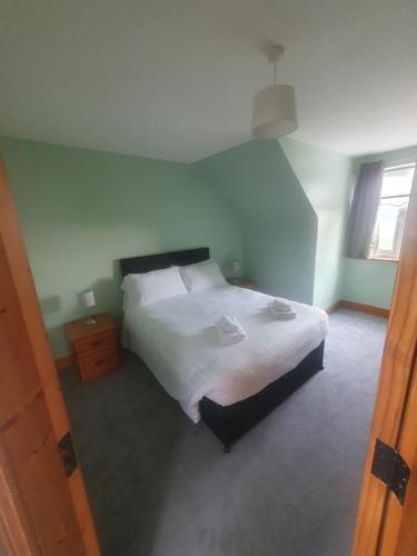 Un ou plusieurs lits dans un hébergement de l'établissement Grange Park House-wild Atlantic way