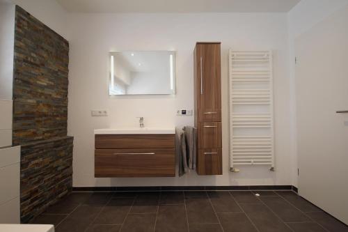 Ett badrum på Hochwertige Maisonette Wohnung - Boardinghouse Gottmadingen