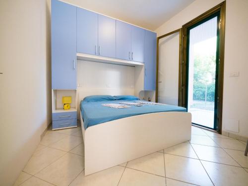 A bed or beds in a room at Pomposa Residence