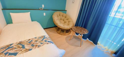 Cama o camas de una habitación en KOHALA　HOTEL
