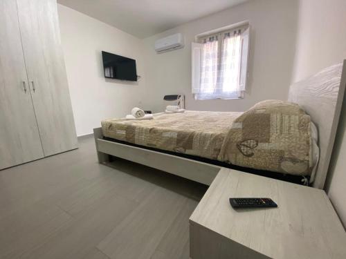 TV a/nebo společenská místnost v ubytování Affittacamere La Casa Dei Nonni