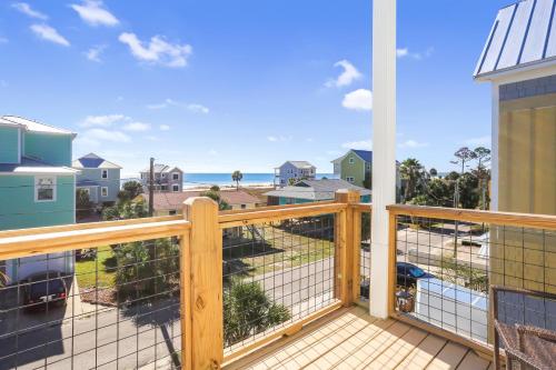 a balcony with a view of the ocean at Eagle's Rest by Pristine Properties Vacation Rentals in Indian Pass