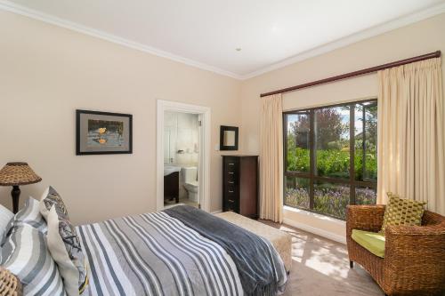Ein Bett oder Betten in einem Zimmer der Unterkunft Pezula, Sunny tranquility