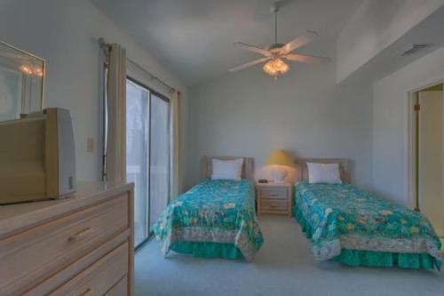 Barrier Dunes 133 - 133 by Pristine Properties Vacation Rentalsにあるベッド