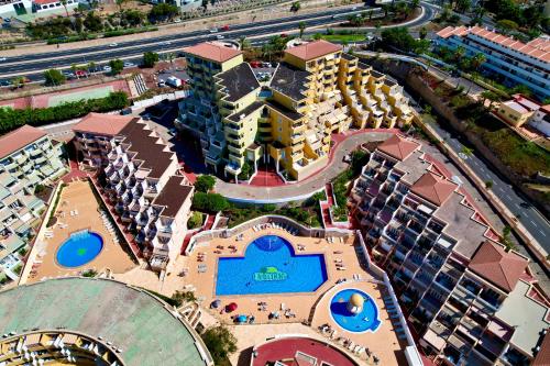 an aerial view of a resort with a swimming pool at Cosy, new studio in Costa Adeje in Adeje