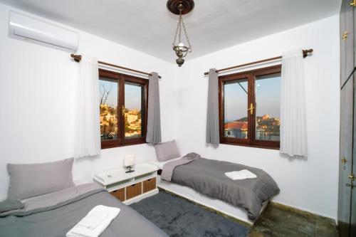 En eller flere senge i et værelse på Casa di Maestro Marathos