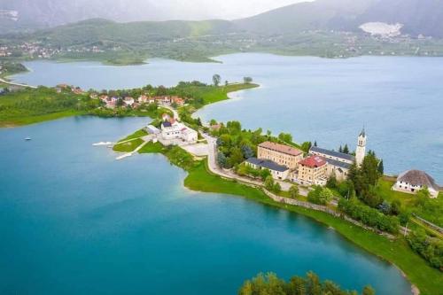 an aerial view of an island in a body of water at Vikendica Bruše in Jaklići