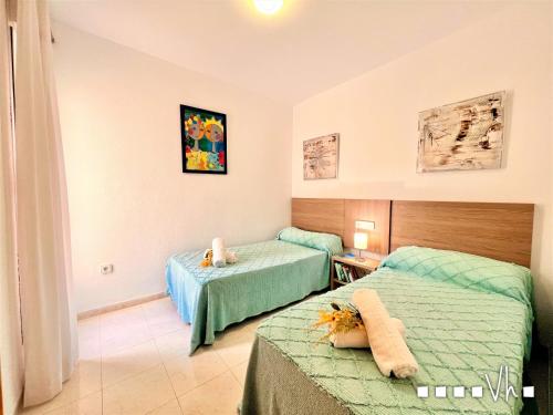 Posteľ alebo postele v izbe v ubytovaní VH Costa Blanca - APARTAMENTO MALVARROSA
