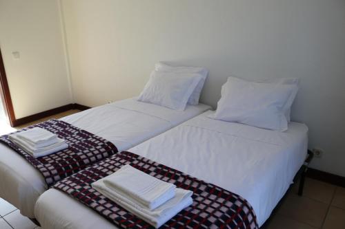 Letto o letti in una camera di HI Guarda - Pousada de Juventude