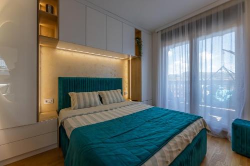 Una cama o camas en una habitación de Jupiter