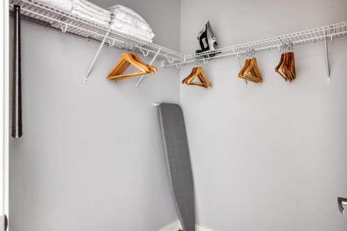 a row of shoes hanging on a wall at Arlington Heights 2br w wd gym bbq nr dining CHI-911 in Arlington Heights