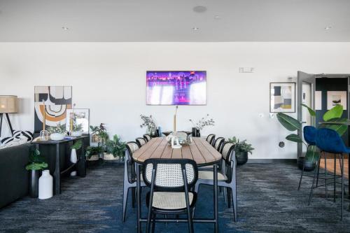 a dining room with a wooden table and chairs at Arlington Heights 2br w wd gym bbq nr dining CHI-911 in Arlington Heights