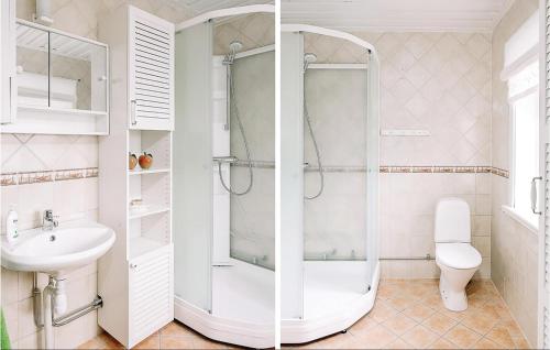 a bathroom with a shower and a sink and a toilet at 2 Bedroom Cozy Home In Lyrestad in Lyrestad