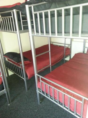 Postel nebo postele na pokoji v ubytování Budget Hostel