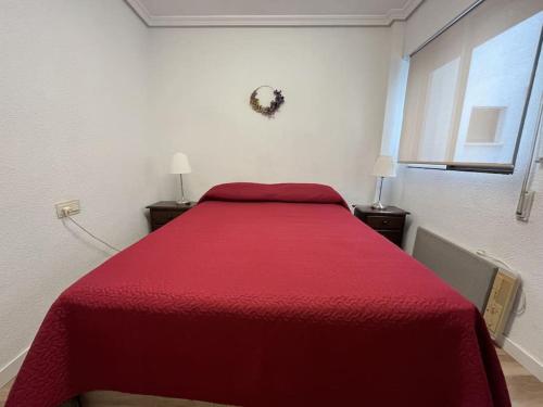 Posteľ alebo postele v izbe v ubytovaní Apartamento Benidorm Aigüera