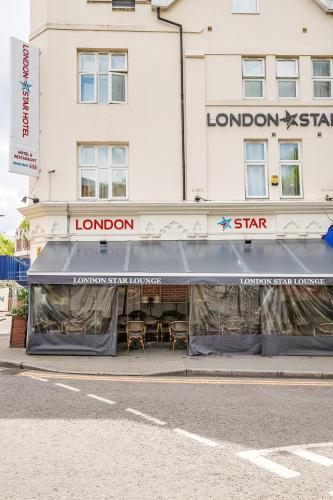 a store front of a building on a street at London Star Hotel in London